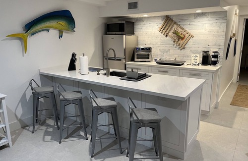 Winston Waterways House | New oceanside Florida Keys canal home with pool minutes from the ocean Key Largo