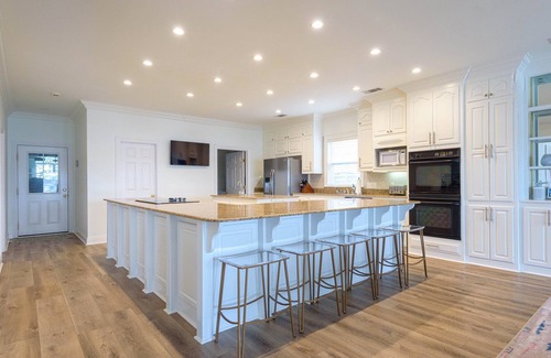 Oscar House | New on the rental market! Lakefront on False River with private dock and pool