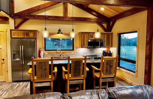 Custer Cabin | New timber frame cabin on secluded wilderness lot near Custer area attractions.