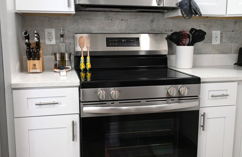 Englewood South House | NEW! Tropical Retreat Cozy Patio ~3 miles to Beach Firepit Wi-Fi A/C