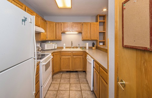 Big Sky Condo | New! Walking distance to town center, Wood stove