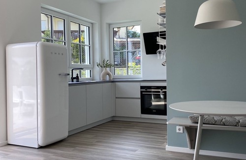Bad Wiessee Apartment | New, with garden, garage parking space, own children's room and yoga & fitness gadgets