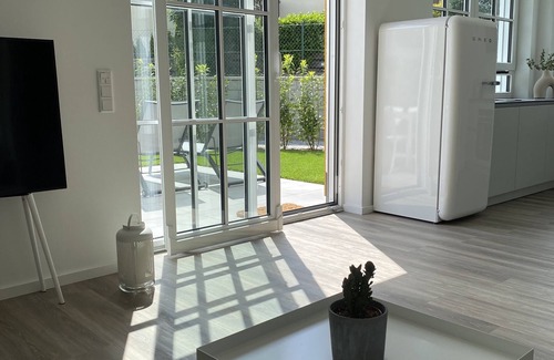 Bad Wiessee Apartment | New, with garden, garage parking space, own children's room and yoga & fitness gadgets