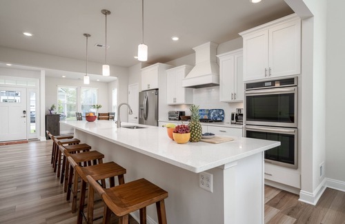 Long Neck House | Newly built end unit townhouse with Pond views in The Peninsula!