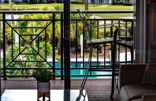 Wesley Chapel Condo | Newly Listed ~ 20% Off~Golf & Tennis Community ~ Serene Oasis ~ Pool and Lake Views