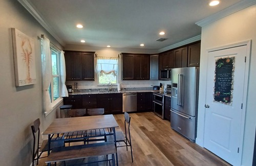 Spring Hill House | Newly remodeled gulf canal home w/floating dock and kayaks