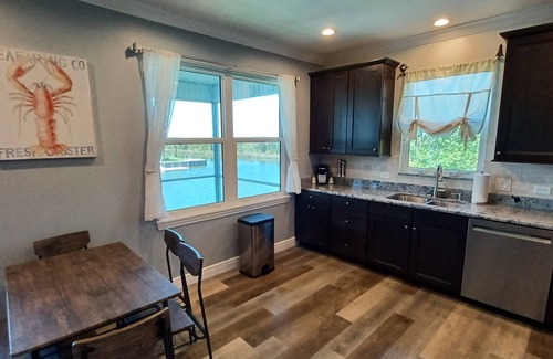 Spring Hill House | Newly remodeled gulf canal home w/floating dock and kayaks