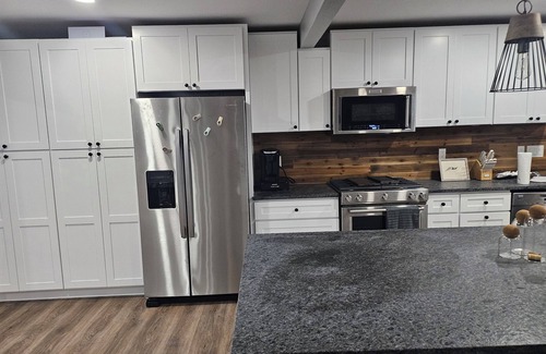 Whitney House | Newly Renovated 1.5 Acre Lake Front Home with Game Room and Direct Lake Access.