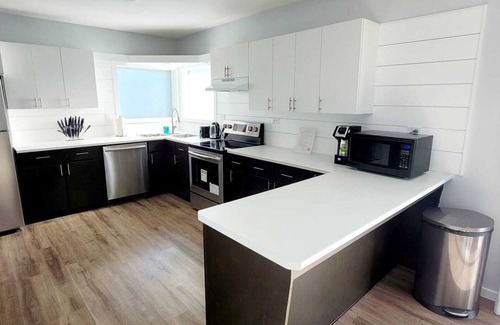 Cochrane House | Newly renovated home in the heart of Cochrane close to lake and downtown