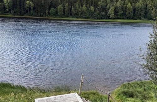 Vindeln Municipality House | Newly Renovated Red Riverfront House