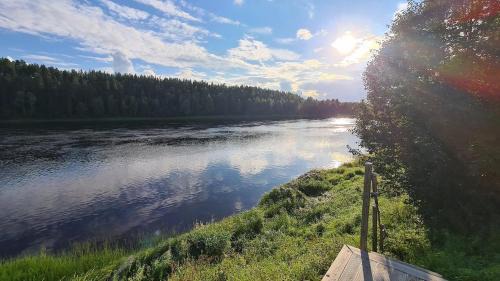 Vindeln Municipality House | Newly Renovated Red Riverfront House