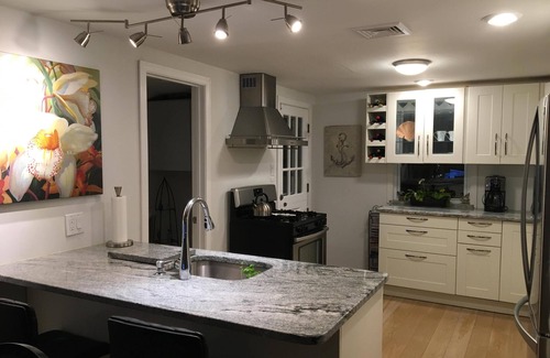 Branford House | Newly Renovated Summer Island Pt Home Surrounded By Water With Spectacular Views