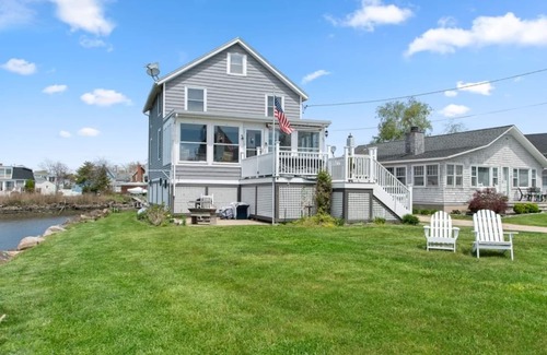 Branford House | Newly Renovated Summer Island Pt Home Surrounded By Water With Spectacular Views