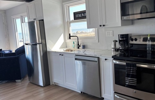 Leamington House | Newly updated 3-bed 2-bath with your own private sandy beach and a creek