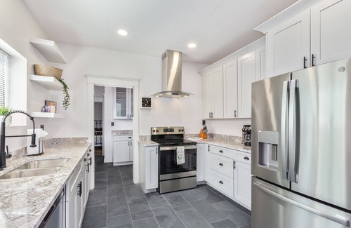 Sam Hughes House | Newly updated charming house with resort-style amenities and centrally located!