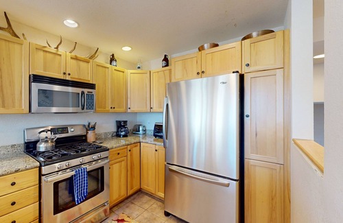 Saddle Ridge House | Newly updated condo with ski-In/ski-out access, a private hot tub & more
