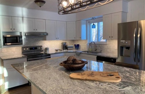 Hamburg Township Cottage | Newly updated waterfront home on chain lakes near Ann Arbor and Pinckney, MI
