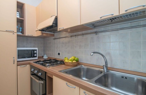 Baia Caddinas Apartment | Nice apartment for 4 guests with WIFI, pool, A/C, TV, terrace and parking