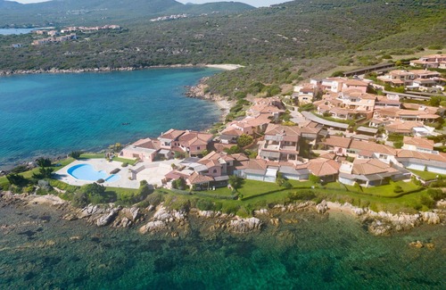 Baia Caddinas Apartment | Nice apartment for 4 guests with WIFI, pool, A/C, TV, terrace and parking