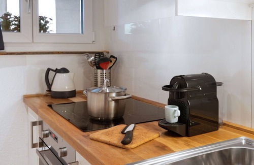 Davos-Dorf Apartment | Nice apartment for 4 guests with pool, WIFI, TV, balcony and parking