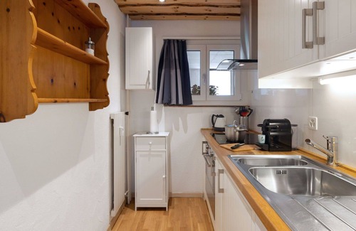 Davos-Dorf Apartment | Nice apartment for 4 guests with pool, WIFI, TV, balcony and parking