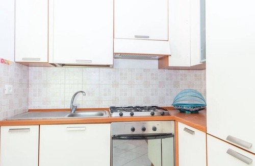 Telti Apartment | Nice apartment for 6 guests with pool, WIFI, TV, patio, pets allowed and parking