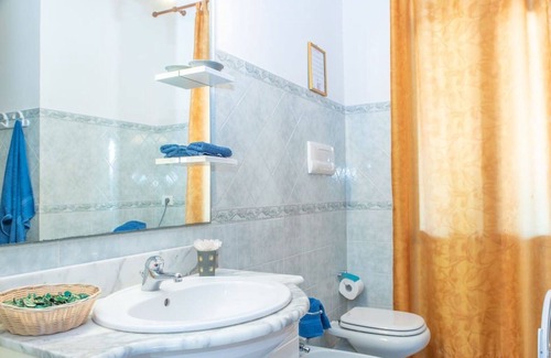 Telti Apartment | Nice apartment for 6 guests with pool, WIFI, TV, patio, pets allowed and parking