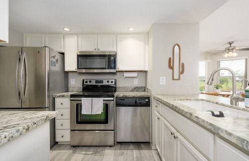Paradise Valley Village Condo | Nicely appointed condo on the golf course and running/biking path!
