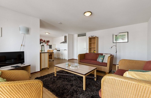 Municipality of Hellevoetsluis Apartment | Nicely furnished 4-pers. apartment with unique harbor view located at Cape Helius holiday park.