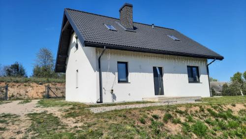 Karwie House | Noclegi u Adama