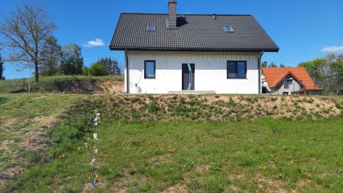 Karwie House | Noclegi u Adama