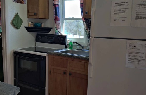Elizabeth Apartment | Norfork Lake - Quaint 2 bedroom, no stairs. By the pool -camp store - pavilion.