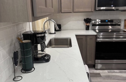 Norton Shores House | Norton Shores Retreat: Stylish Comfort in the Heart of the City