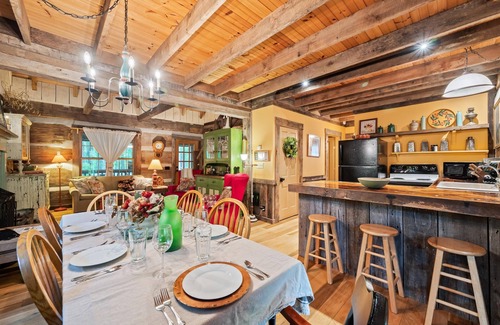 Gnaw Bone Cabin | Nostalgic log cabin antique furnishings nestled in wooded serenity Pet Friendly!