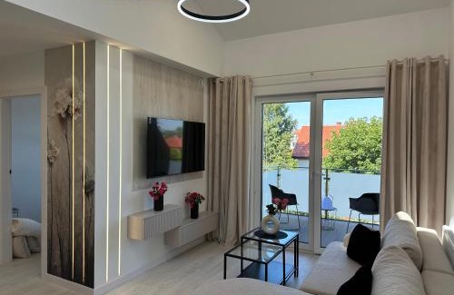 Biskupiec Apartment | Nowy apartament z dwoma sypialniami i garażem