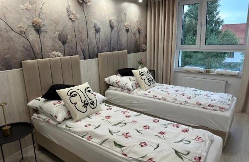 Biskupiec Apartment | Nowy apartament z dwoma sypialniami i garażem