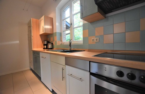 Rerik Apartment | Nr. 1 Fewo mit Kamin und Terrasse - Ferienwohnungen Alter Bahnhof mit Terrasse und Garten OFC 06