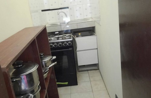 Libreville Apartment | Nzecy Appart. A studio with a velvety, air-conditioned living room.