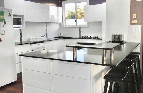 Woodgate House | Ocean Front 'Beachie' Holiday Home!