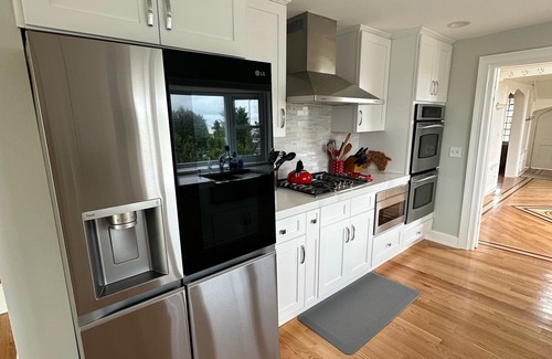 Long Branch House | Ocean Front Beauty with Private Beach, Grass Yard, Beach Volleyball and. More!