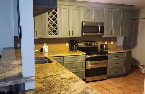 Long Key Condo | Ocean front gated privacy with 3 bedrooms and protected boat slip.