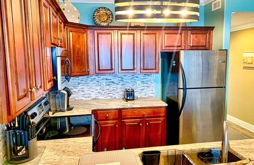 West Panama City Beach Condo | Ocean Front Paradise with Million Dollar Sunset Views and Free Beach Chairs!