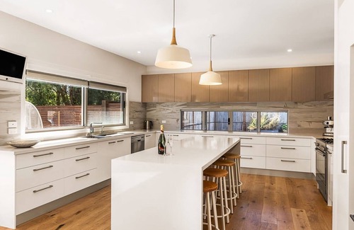 St. Andrews Beach House | Ocean Luxe Retreat | Entertainer with Pool and Tennis Court