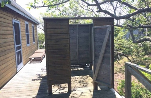 Water Island House | Ocean View 2BR Cottage just 100' off the expansive Fire Island ocean beach.