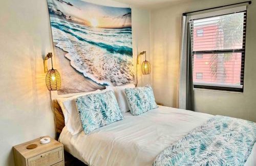 St. Pete Beach Apartment | Ocean view balcony with heated pool