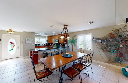 Cutthroat Harbor Estates House | Ocean-view snowbird retreat with private pool, rooftop, lanais, kayak & bikes