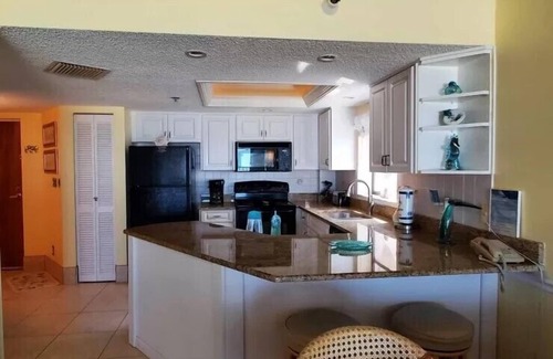 St. Pete Beach Condo | 🌊 Oceanfront Elegance with Walkout Balcony