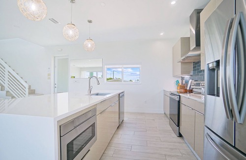 Little Venice House | Oceanfront PARADISE w Heated pool, 55’ dock, ocean view & bathroom in every room