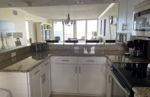 Port Orange Condo | Oceanfront, non-drive beach, heated pool, sport courts, gym
