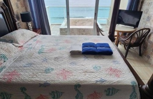 Guaniquilla House | Oceanview Room at Hotel Colombus